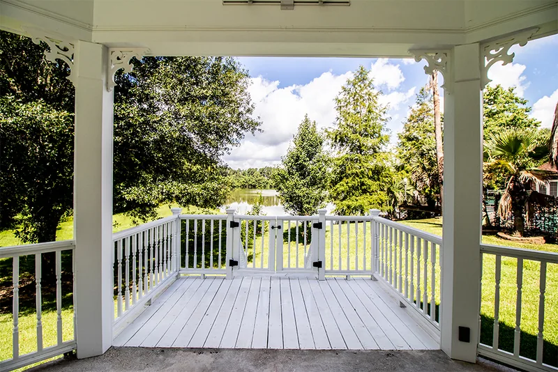 View from a custom covered gazebo toward the yard and water